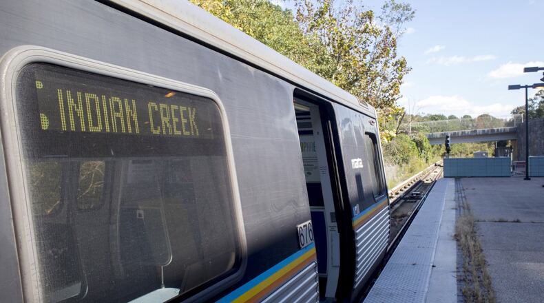 A train sits at the Indian Creek MARTA station in unincorporated DeKalb County, which is currently the eastern end of the rail line. The DeKalb County Commission recently approved a resolution supporting extending MARTA further east toward Stonecrest. AJC file photo. (CASEY SYKES / CASEY.SYKES@AJC.COM)