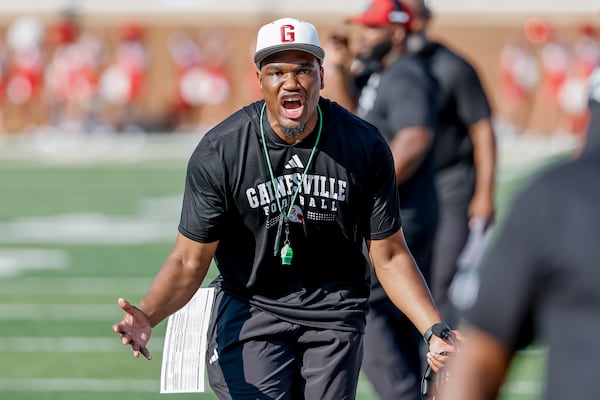 Gainesville coach Santavious Bryant reacts during the first half against Buford on Saturday, Aug. 22, 2026, in Buford. (Erik S. Lesser for the AJC)