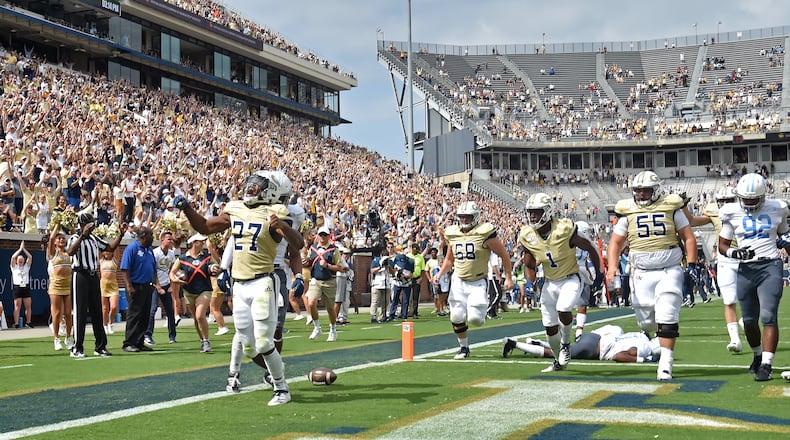 Georgia Tech running back Jordan Mason (27) celebrates after he scored a touchdown in the second half. (Hyosub Shin / Hyosub.Shin@ajc.com)