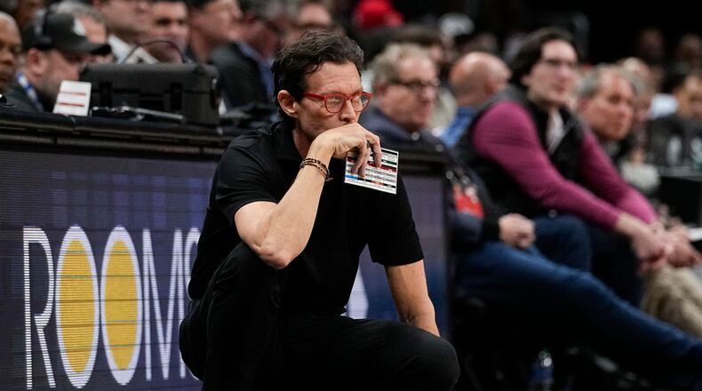 Atlanta Hawks head coach Quin Snyder watches from the sideline during the second half of an NBA basketball game against the Denver Nuggets, Monday, Dec. 11, 2023, in Atlanta. (AP Photo)