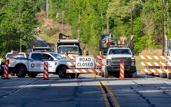 Buford Highway is closed at the intersection of Percival Drive on Tuesday, April 14, 2026. The road closure started just after 5 a.m. (Ben Hendren for the AJC)