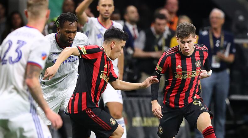 March 8, 2020 Atlanta: Atlanta United midfielders Ezequiel Barco (left) and Matheus Rossetto work against FC Cincinnati during a 2-1 victory in a MLS soccer match on Saturday, March 8, 2020, in Atlanta. Curtis Compton ccompton@ajc.com