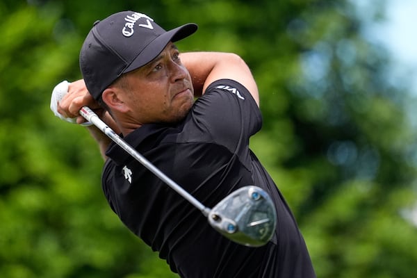 Xander Schauffele watches his tee shot on the 16th hole during a practice round for the PGA Championship golf tournament at the Quail Hollow Club, Wednesday, May 14, 2025, in Charlotte, N.C. (AP Photo/George Walker IV)