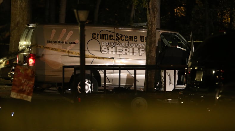 Authorities were preparing to search the Douglasville apartment where 75-year-old Florene Duke was found dead and hog-tied earlier in Monday evening. (BEN GRAY / BGRAY@AJC.COM)