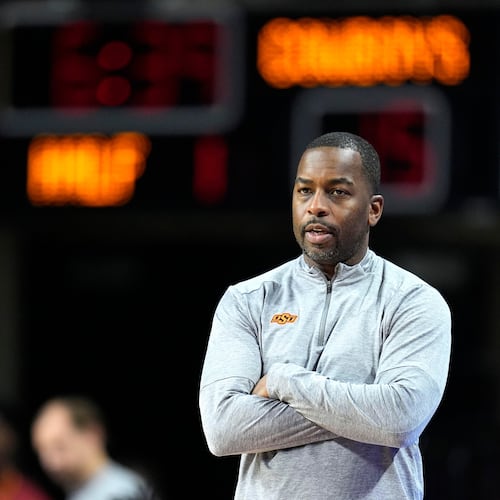 FILE - Oklahoma State head coach Mike Boynton watches from the bench during the first half of an NCAA college basketball game against Iowa State, Jan. 13, 2024, in Ames, Iowa. (AP Photo/Charlie Neibergall, File)