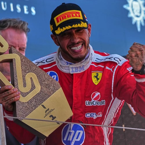 Ferrari driver Lewis Hamilton of Britain celebrates after wining the Spain F1 Grand Prix race at the Barcelona Catalunya racetrack in Montmelo, near Barcelona, Spain, Sunday, June 14, 2026. (AP Photo/Fatima Shbair)