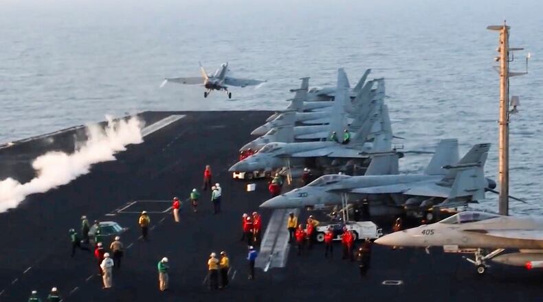 FILE - This image taken from video provided by the U.S. Navy shows an aircraft launching from the USS Harry S. Truman in the Red Sea before airstrikes in Sanaa, Yemen, March 15, 2025. (U.S. Navy via AP, File)