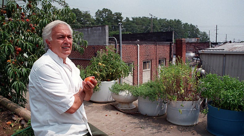 Gabe Bencivenga the former co-owner of Gene and Gabe s Italian Lodge on the rooftop of his restaurant where he hasd several fruit trees and vegetables growing from barrels and drums. Bencivenga's restaurants and cabaret were the place to be in Atlanta and Roswell. He died earlier this week. AJC File