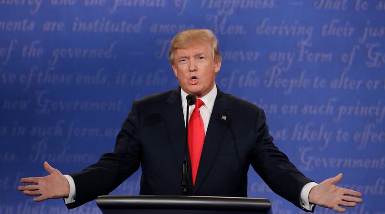 Republican presidential nominee Donald Trump speaks during the third presidential debate with Democratic presidential nominee Hillary Clinton at UNLV in Las Vegas, Wednesday, Oct. 19, 2016. (AP Photo/David Goldman)