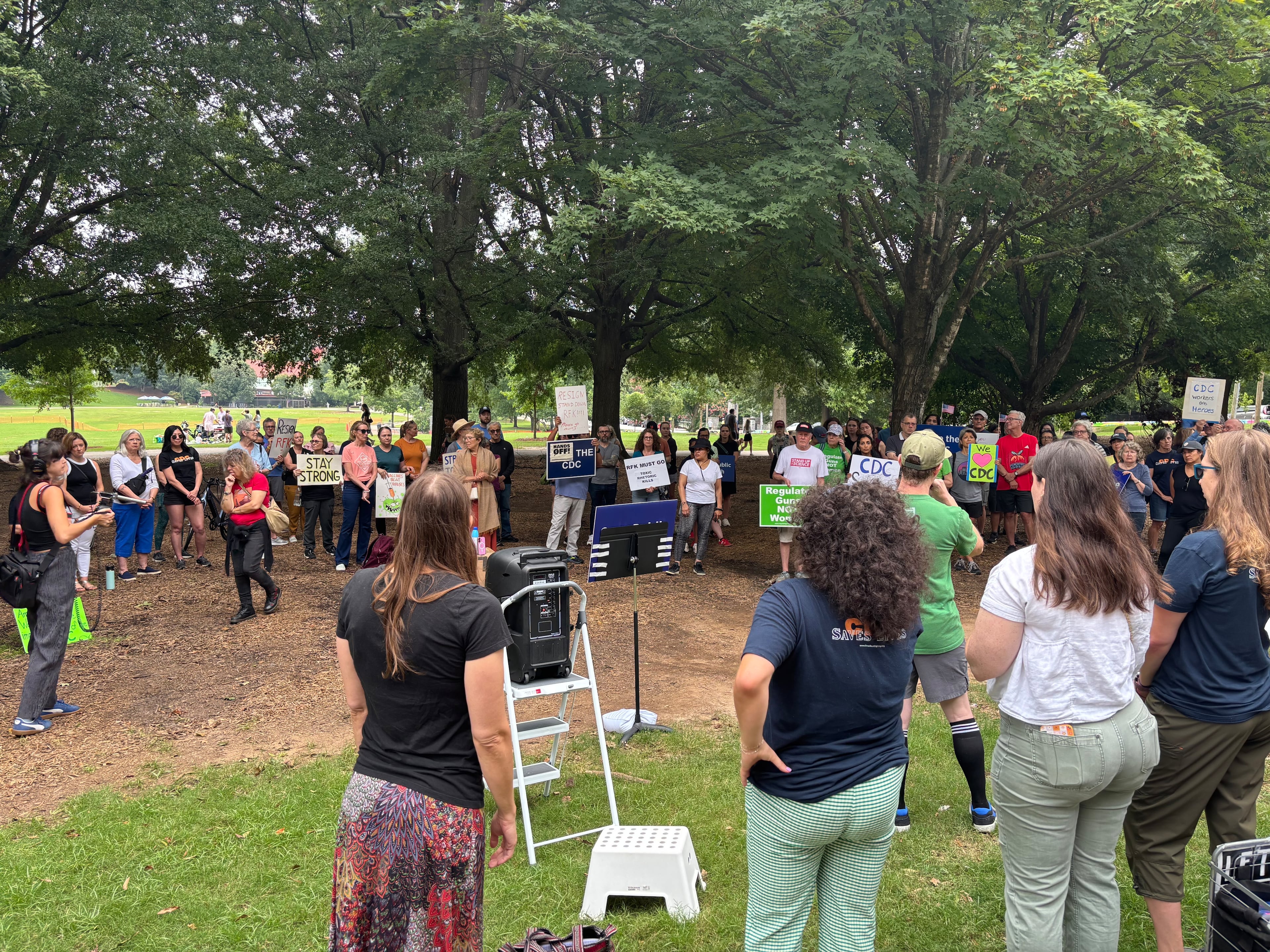 More than 50 people attend the rally in Atlanta's Piedmont Park on Sunday, Aug. 10, 2025, two days after a gunman opened fire at the Centers for Disease Control and Prevention. (David Aaro/AJC)