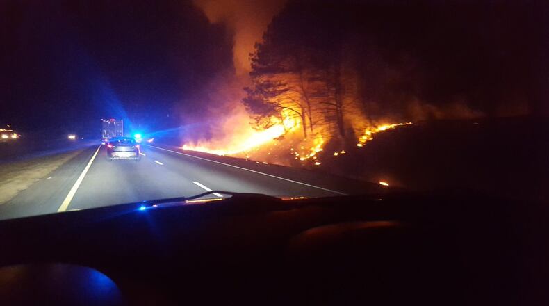 Huge flames could be seen early Wednesday on southbound I-85 before Hamilton Mill Road in Gwinnett County. (Credit: Nick Ellsworth)