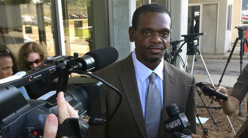 Henry McCollum walks out of prison in 2014 in Raleigh, North Carolina.