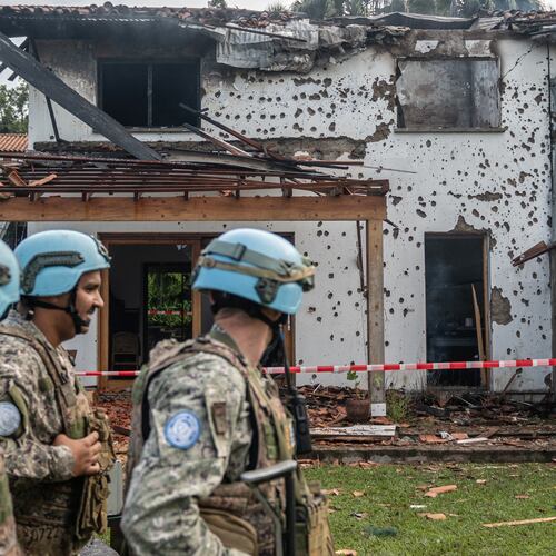 U.N peacekeepers guard a house hit by a drone strike in Goma, Democratic Republic of Congo, Wednesday, March 11, 2026. (AP Photo/Moses Sawasawa)