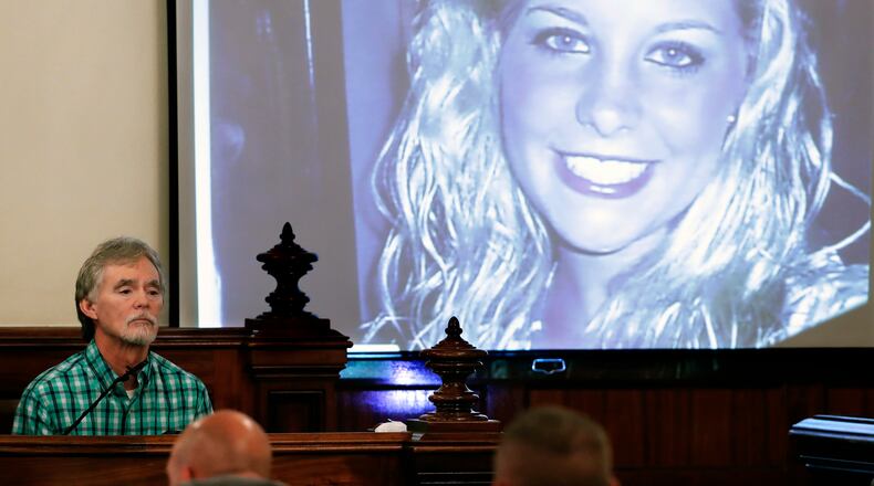 Dana Bobo, father of Holly Bobo, testifies in the trial of Zach Adams as a photo of Holly is displayed in Savannah, Tennessee. Jason Autry pleaded guilty Monday to taking part in the killing more than nine years ago, but he is expected to be released soon as part of a deal with prosecutors. (AP file photo)
