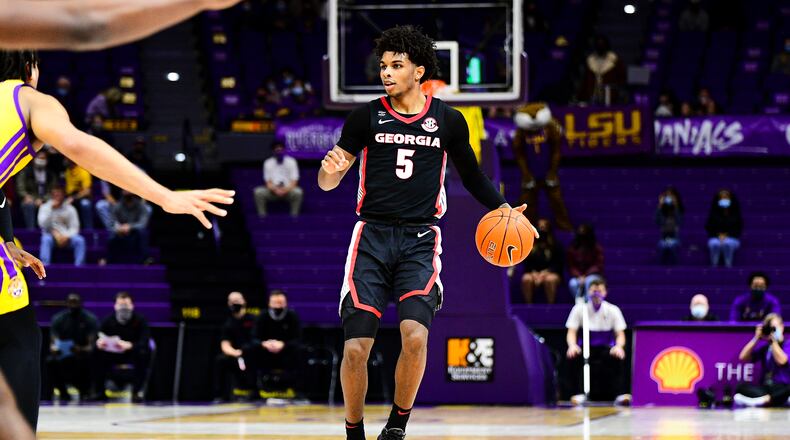 Georgia guard Justin Kier (5) brings the ball up the floor against LSU in Baton Rouge this past Wednesday. The graduate transfer made six 3-pointers and led the Bulldogs with 25 points in the 94-92 overtime loss.