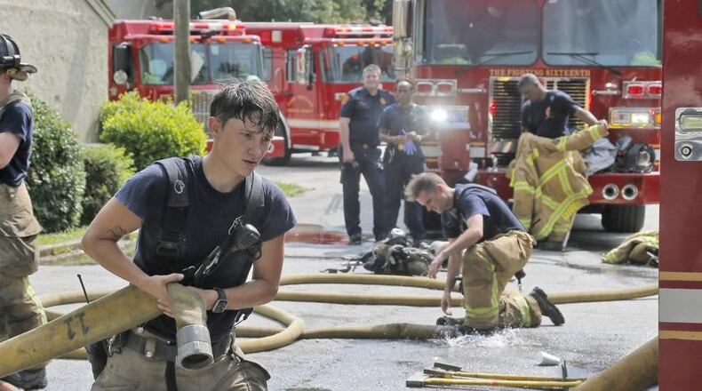DeKalb firefighters on the scene of an apartment fire in 2017.