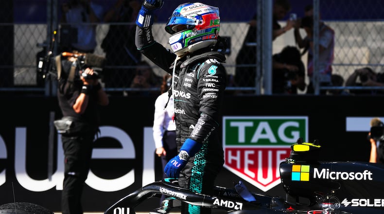 Mercedes driver Andrea Kimi Antonelli of Italy celebrates after winning the Spanish Formula One Grand Prix race in Madrid, Sunday, Sept. 13, 2026. (AP Photo/Manu Fernandez)