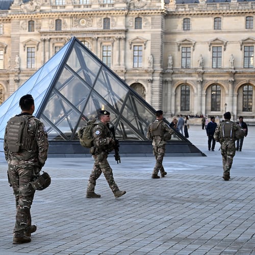Soldiers patrol in the courtyard of the Louvre museum, Thursday, Oct. 30, 2025 in Paris. (AP Photo/Emma Da Silva)