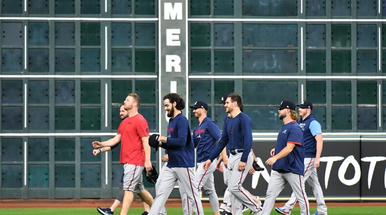 October 25, 2021 Houston, Texas - Atlanta Braves pitchers on the field during workout in preparation for Game 1 of baseball's World Series against Houston Astros at Minute Maid Park in Houston on Monday, October 25, 2021. (Hyosub Shin / Hyosub.Shin@ajc.com)