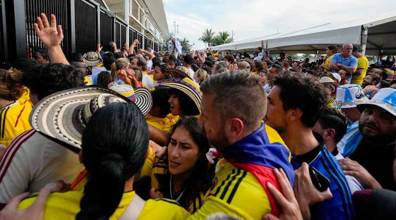 FILE - Fans wait to enter the stadium prior to the Copa America final soccer match between Argentina and Colombia in Miami Gardens, Fla., July 14, 2024. (AP Photo/Lynne Sladky, File)