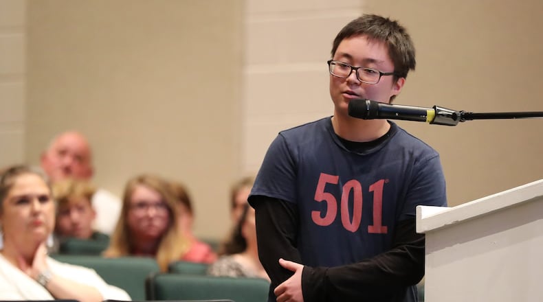 Kino Ciel Stanfield, 20,a 2017 Pickens High graduate who started his transition after graduation, speaks during a school board meeting Monday to address transgender students’ use of school bathrooms. CURTIS COMPTON/CCOMPTON@AJC.COM