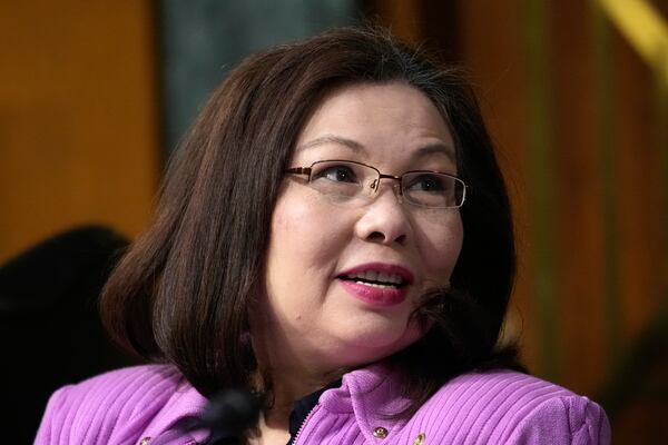 Sen. Tammy Duckworth, D-Ill., the ranking member of the Senate Transportation Subcommittee, prepares for a hearing to examine the preliminary report by the National Transportation Safety Board on the Jan. 29, 2025, midair collision of an Army Black Hawk helicopter and an American Airlines regional jet, on Capitol Hill in Washington, Thursday, March 27, 2025. Sen. Duckworth was a Black Hawk pilot during the Iraq War. (AP Photo/J. Scott Applewhite)(AP Photo/J. Scott Applewhite)