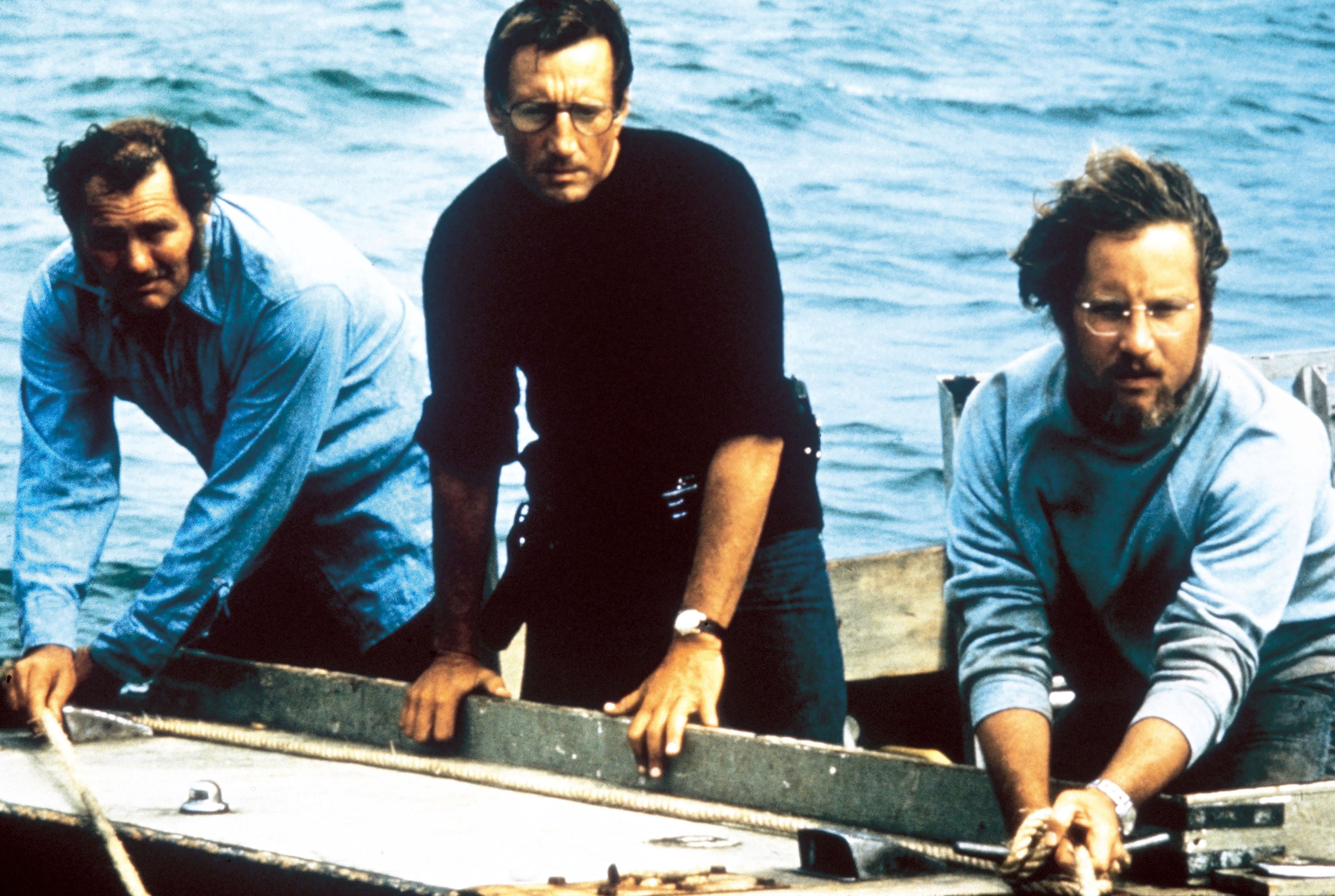 Robert Shaw (from left), Roy Scheider and Richard Dreyfuss in "Jaws." On its 50th anniversary, the Hollywood classic is showing at Roswell's Aurora Cineplex for one week only. (Courtesy of Zanuck/Brown Productions/Universal Pictures/ZUMA Press)