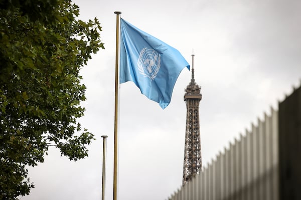 The UNESCO flag flies at its headquarters Tuesday, July 22, 2025 in Paris. (AP Photo/Thomas Padilla)