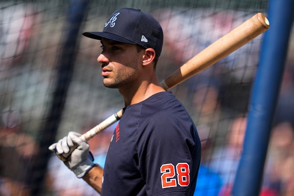 Matt Olson, thinking about everything but taking a day off. (Mike Stewart/AP)
