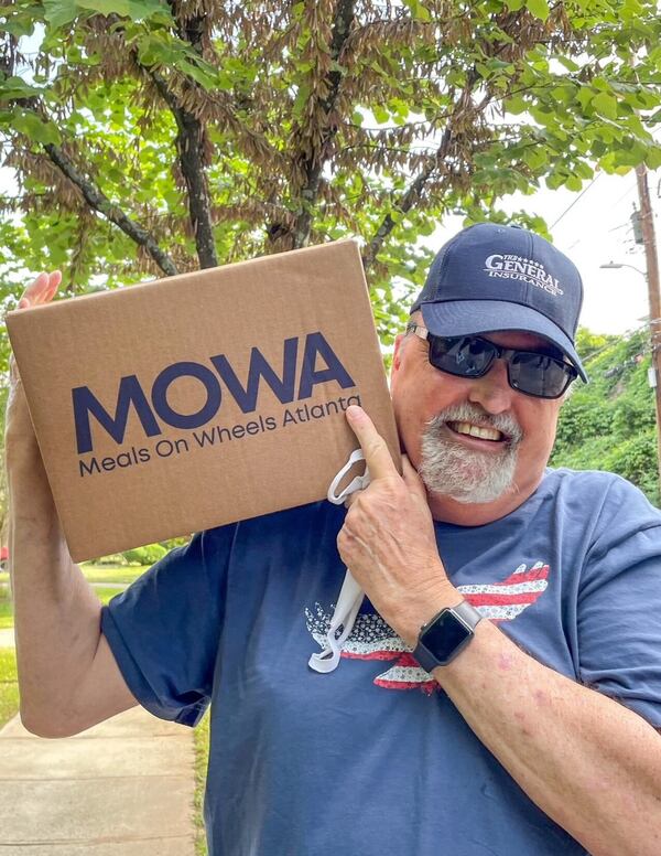 Meals On Wheels Atlanta volunteer George Messner prepares to deliver food to recipients. (Courtesy of Meals On Wheels Atlanta)