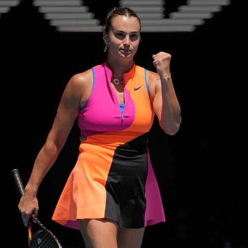 Aryna Sabalenka of Belarus reacts after defeating Victoria Mboko of Canada in their fourth round match at the Australian Open tennis championship in Melbourne, Australia, Sunday, Jan. 25, 2026. (AP Photo/Dita Alangkara)
