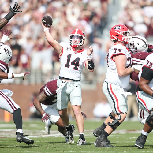 Georgia quarterback Gunner Stockton (14) throws a pass against Mississippi State during the first half of an NCAA college football game in Starkville, Miss., Saturday, Nov. 8, 2025. (AP Photo/James Pugh)