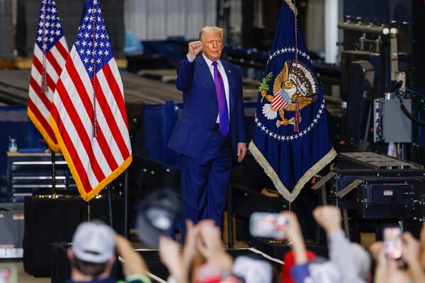 President Donald Trump leaves after speaking at his rally at Coosa Steel service center in Rome on Thursday, Feb. 19, 2026. It was Trump’s first visit to Georgia since his reelection. (Arvin Temkar/AJC)