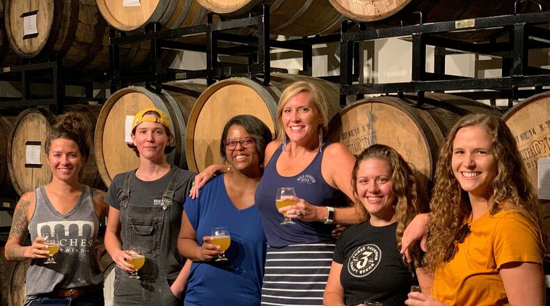Women in the metro area’s brewing industry include (from left) Ashley Henry of Arches Brewing; Christine Stevens of New Realm Brewing; Rebecca Royster of Dames and Dregs Beer and Festival; Sarah Young of Wild Heaven Beer; Salina Copeland of Three Taverns Brewery; and Dallas Fitzgibbon of Monday Night Brewing. CONTRIBUTED BY DAMES AND DREGS