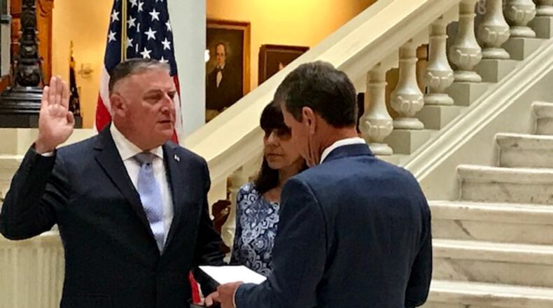 John King, the longtime Doraville police chief, was sworn in Monday as acting Georgia insurance commissioner.