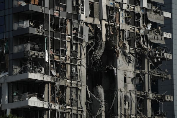 A residential building that was struck by a missile fired from Iran, is seen in Tel Aviv, Israel, on Saturday, June 14, 2025. (AP Photo/Leo Correa)