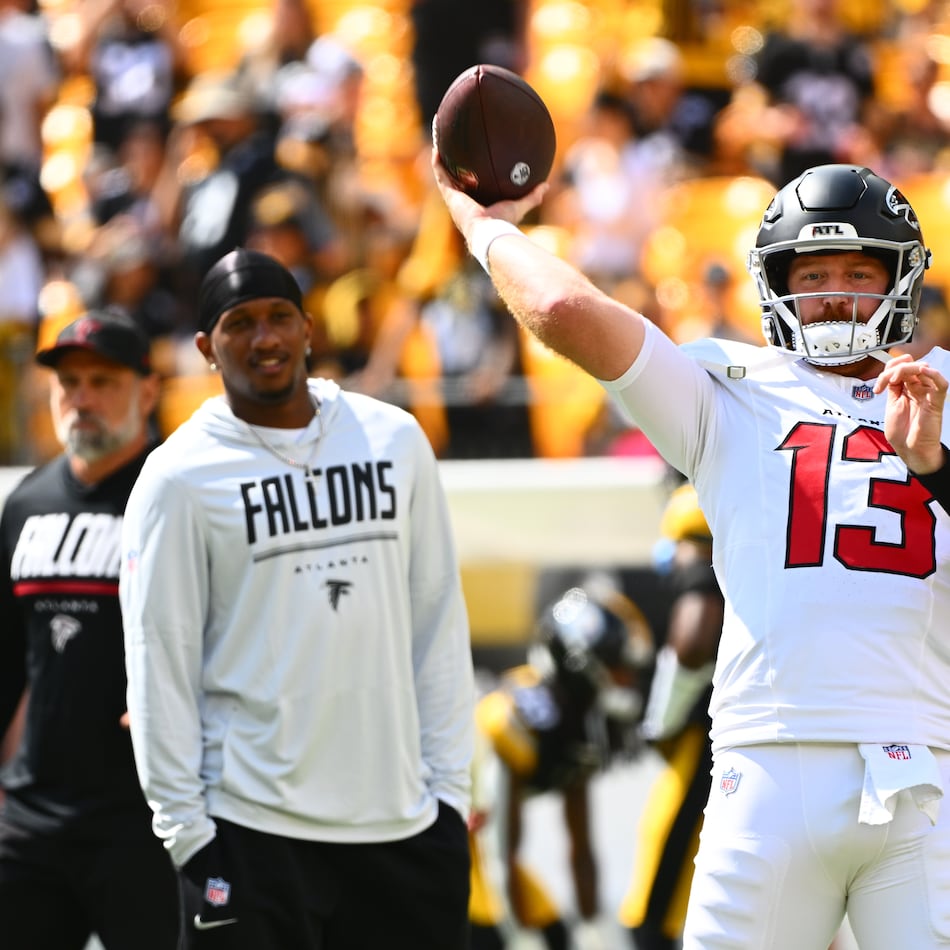 Falcons quarterbacks Tua Tagovailoa (from left) and Michael Penix Jr. watch as Cooper Rush prepares to face the Steelers on Sunday, Sept. 13, 2026, in Pittsburgh. Rush emphasized quick, underneath releases in Week 1. (Justin Berl/AP)