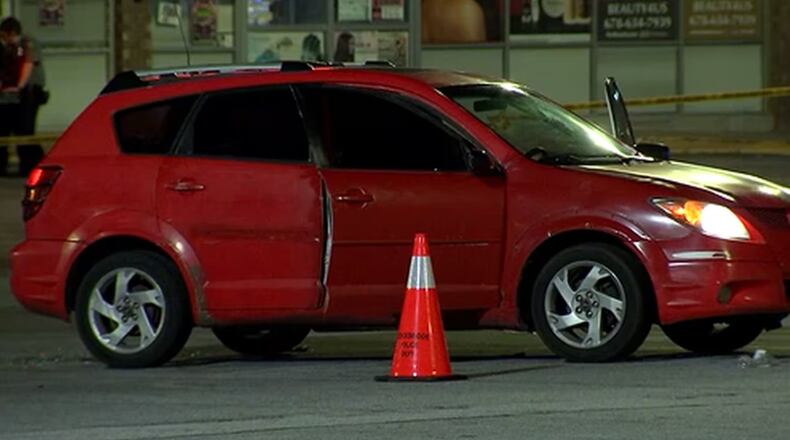 A shooting broke out in the parking lot of a Stockbridge shopping center, according to police.