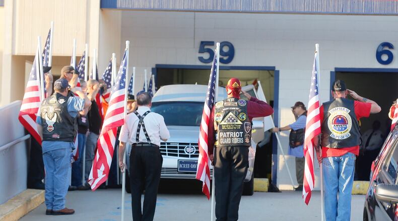 The remains of Korea War vet Cpl. Terrell J. Fuller, who went missing 67 years ago, arrived at the airport Thursday morning and was escorted to his hometown of Toccoa, where residents gathered for a hero's welcome. Bob Andres / bandres@ajc.com