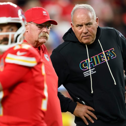 Kansas City Chiefs head coach Andy Reid, rear left, and special teams coordinator Dave Toub, right, confer during warmups before an NFL football game against the Detroit Lions, Sunday, Oct. 12, 2025 in Kansas City, Mo. (AP Photo/Reed Hoffmann, File)