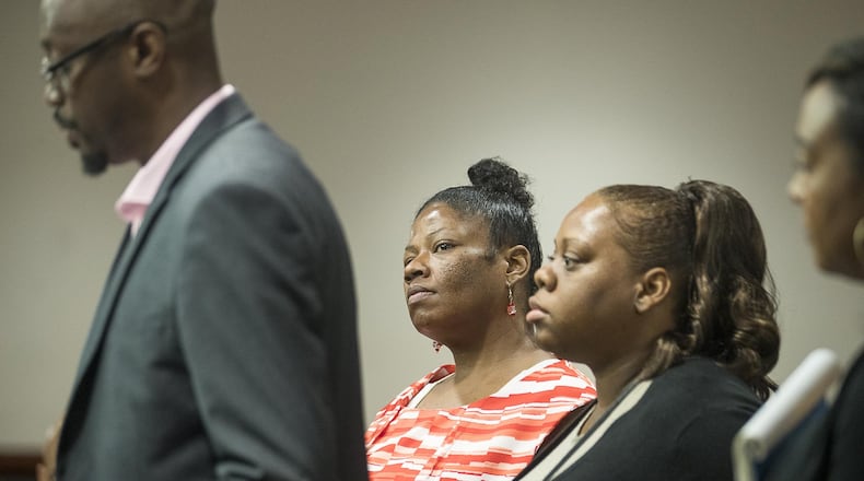 Angela Dalton (center) appeared in front of Atlanta Municipal Court Judge Herman Sloan as part of court-ordered monitoring in an October 2018 case. The court had no set program for a woman facing her challenges, so attorneys worked with social workers and others to cobble one together. ALYSSA POINTER / ALYSSA.POINTER@AJC.COM