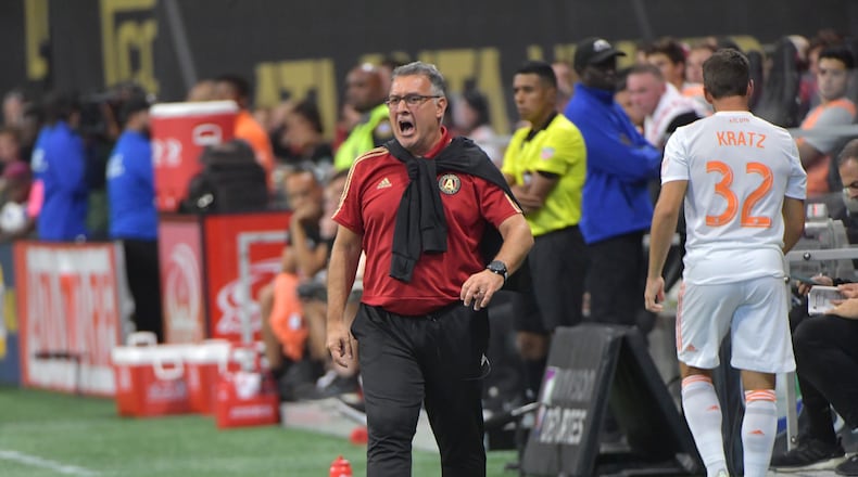 July 21, 2018  - Atlanta United head coach Gerardo Martino shouts instructions during the second half in a MLS soccer game at Mercedes-Benz Stadium on Saturday, July 21, 2018. Three more goals from Josef Martinez set a new MLS record lifted Atlanta United to a 3-1 victory over D.C. United on Saturday at Mercedes-Benz Stadium. HYOSUB SHIN / HSHIN@AJC.COM