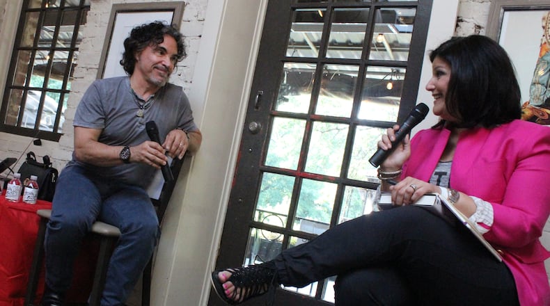John Oates and Mara Davis discuss his new memoir, "Change of Seasons." Photo: Melissa Ruggieri/AJC