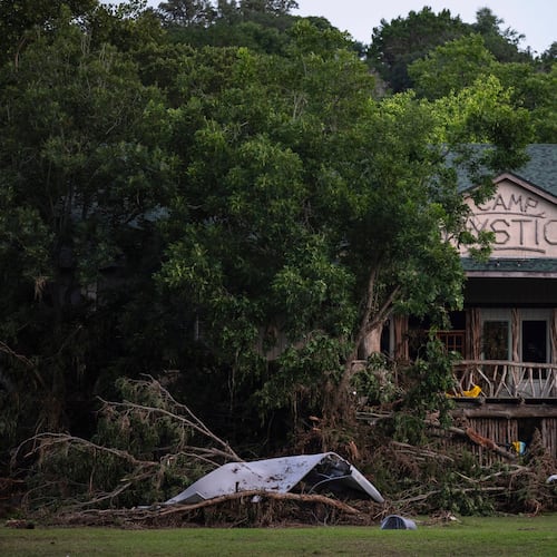 FILE - Debris covers the area of Camp Mystic in Hunt, Texas, July 7, 2025, after a flash flood swept through the area. (AP Photo/Eli Hartman, File)