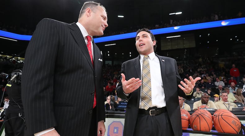 December 20, 2016, ATLANTA: Georgia head coach Mark Fox (left) and Georgia Tech head coach Josh Pastner greet each other as the two state rivals face off in a NCAA college basketball game on Tuesday, Dec. 20, 2016, in Atlanta. Curtis Compton/ccompton@ajc.com