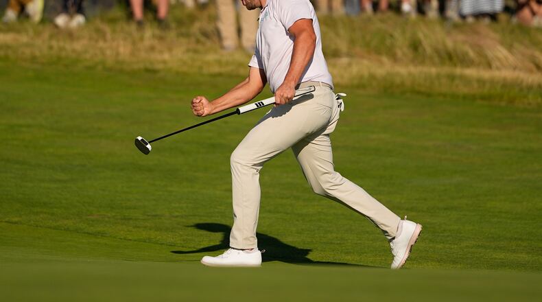 Wyndham Clark celebrates after a birdie on the 16th hole during the final round of the U.S. Open golf tournament at Shinnecock Hills Golf Club in Southampton, N.Y., Sunday, June 21, 2026. (AP Photo/Gerald Herbert)