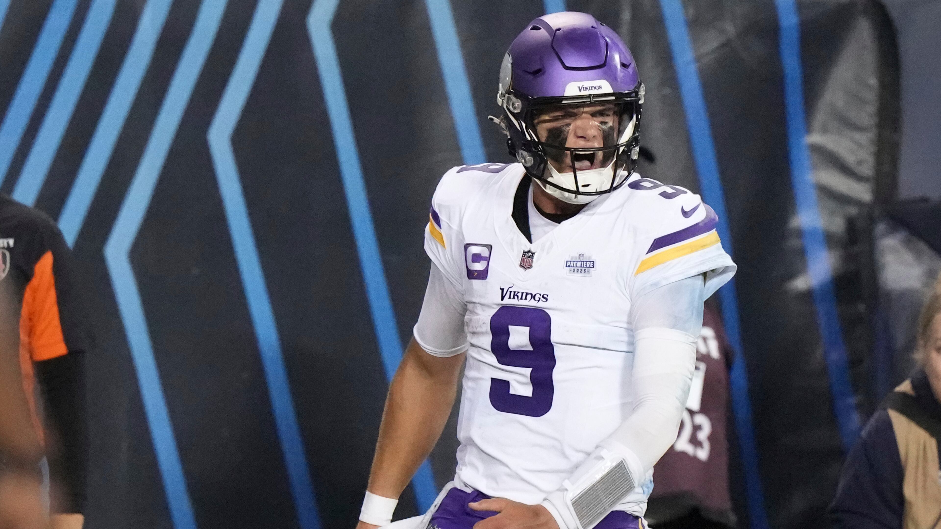 Minnesota Vikings quarterback J.J. McCarthy celebrates after scoring during the second half of an NFL football game against the Chicago Bears Monday, Sept. 8, 2025, in Chicago. (AP Photo/Nam Y. Huh)
