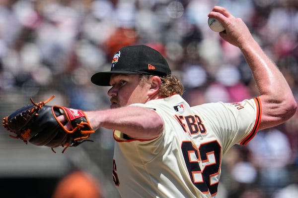 San Francisco Giants' Logan Webb pitches to an Atlanta Braves batter during the fourth inning of a baseball game Saturday, June 7, 2025, in San Francisco. (AP Photo/Godofredo A. Vásquez)