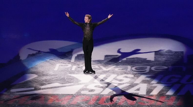 Gold medalist Ilia Malinin arrives for the metal ceremony after the men's free skate competition at the U.S. Figure Skating Championships, Saturday, Jan. 10, 2026, in St. Louis. (AP Photo/Jeff Roberson)