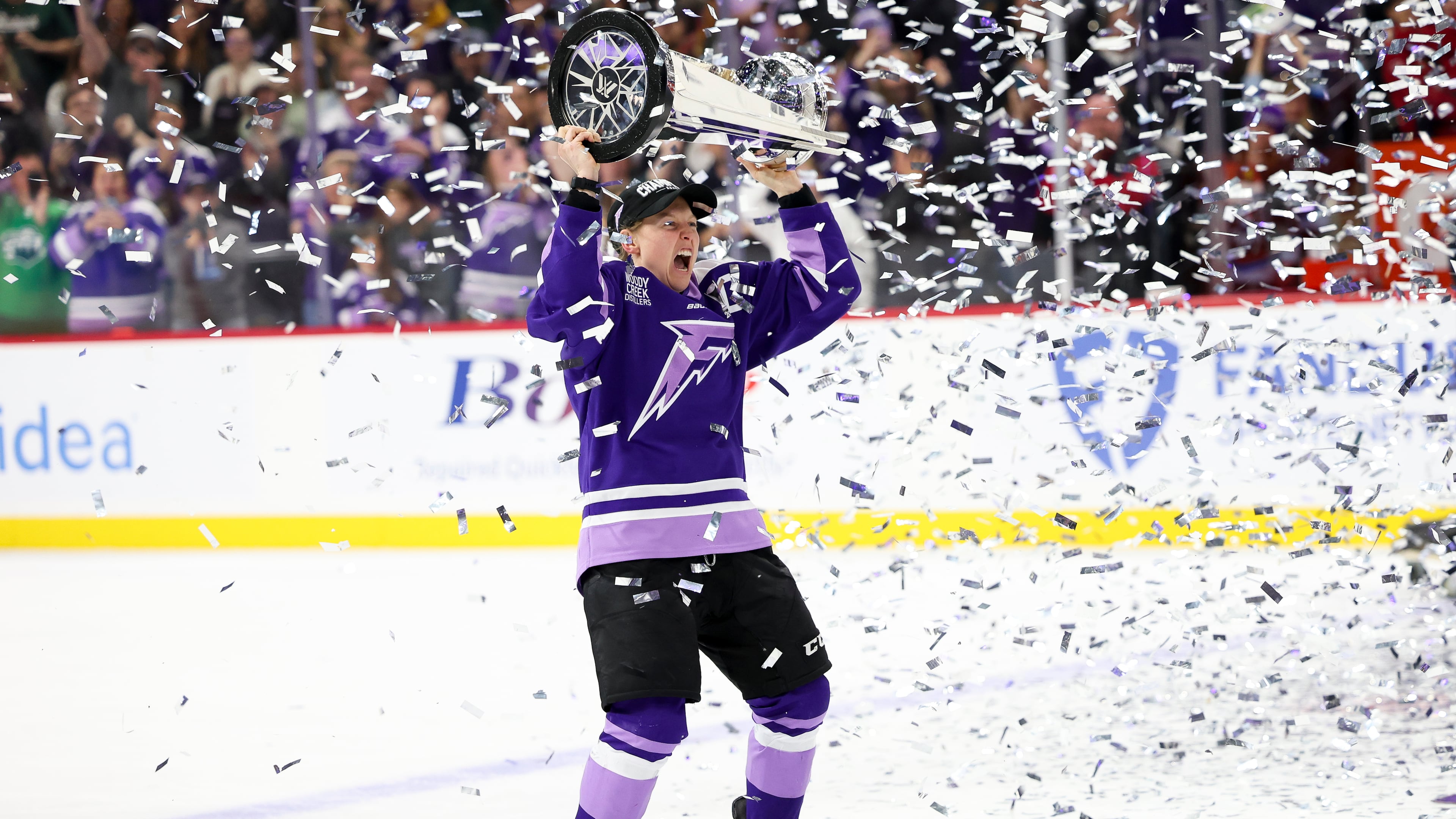 FILE - Minnesota Frost forward Kendall Coyne Schofield celebrates with the Walter Cup after her team won the PWHL hockey finals against the Ottawa Charge, May 26, 2025, in St. Paul, Minn. (AP Photo/Ellen Schmidt, File)